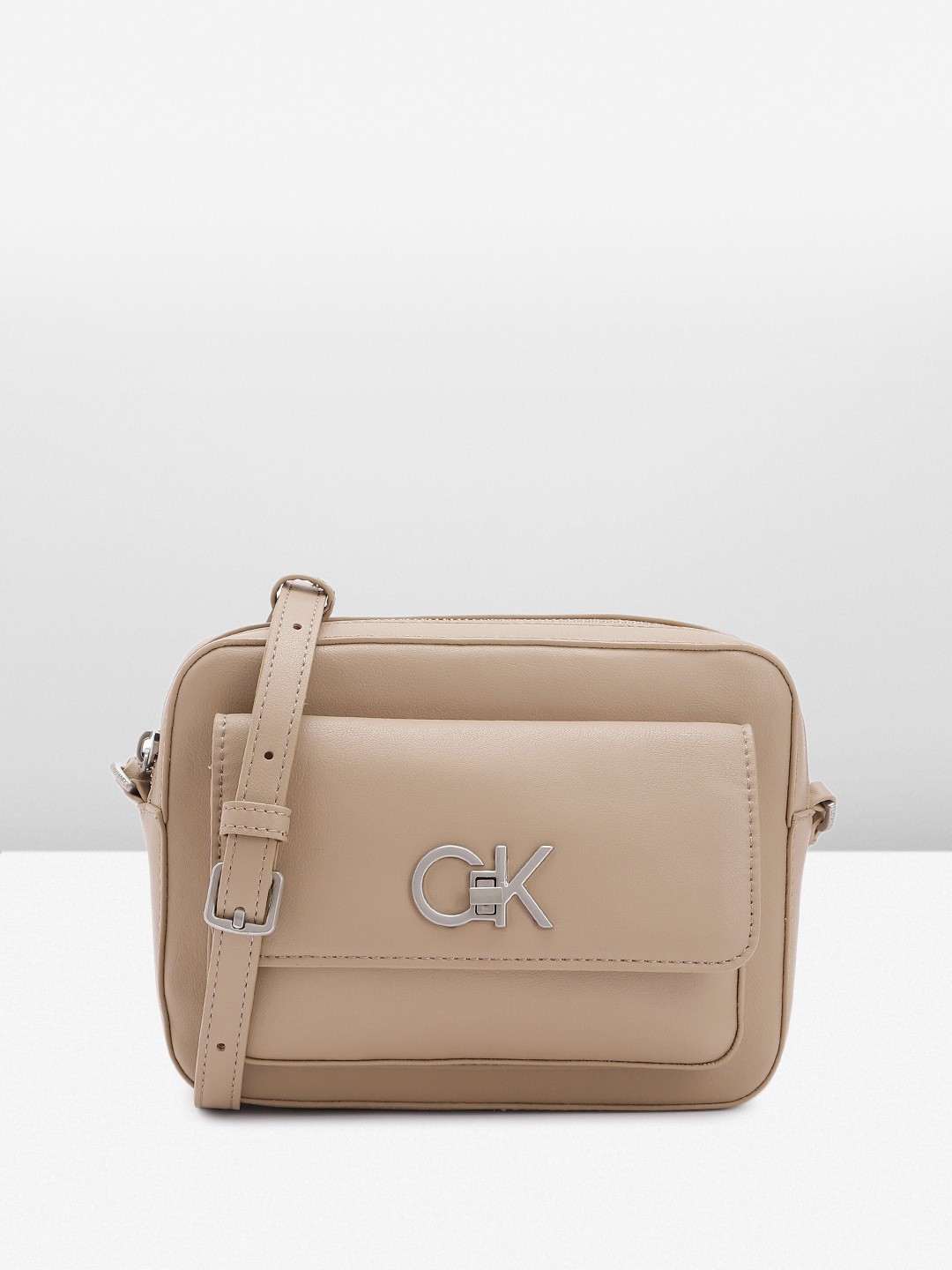 

Calvin Klein Women Solid Sling Bag, Grey