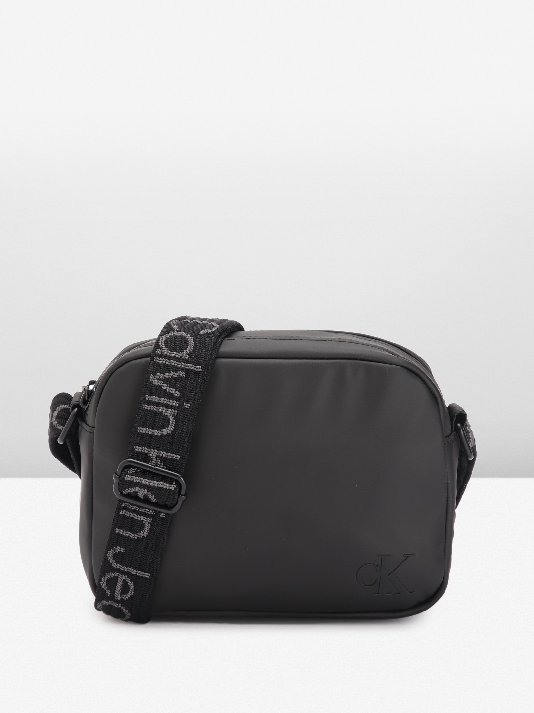 

Calvin Klein Women Solid Sling Bag, Black
