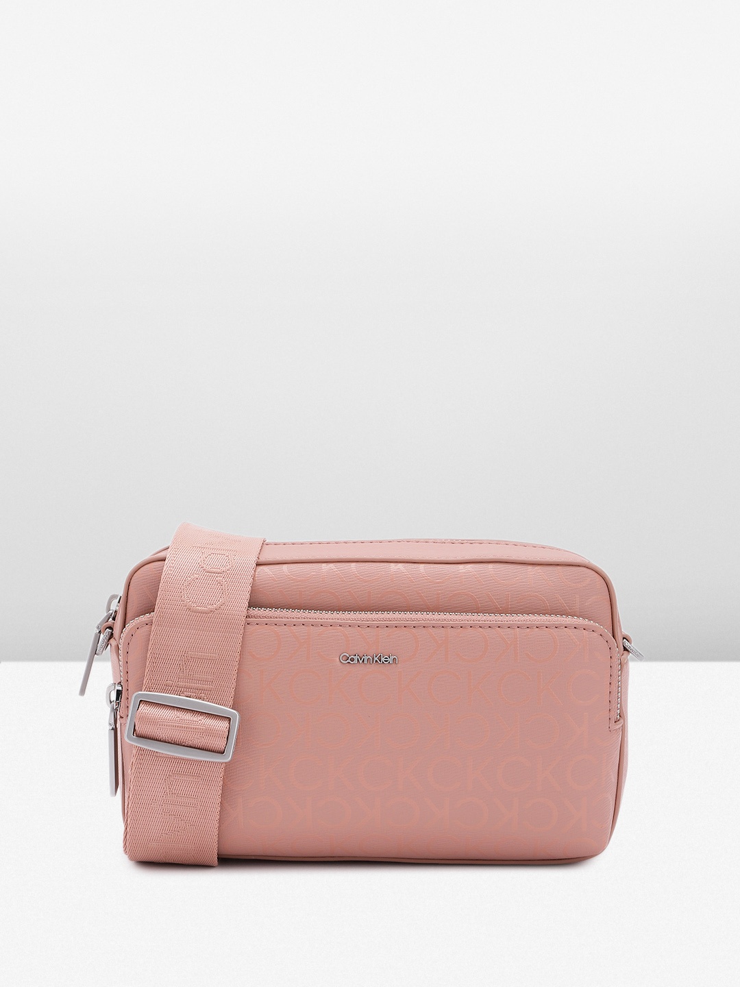 

Calvin Klein Women Brand Logo Printed Sling Bag, Pink