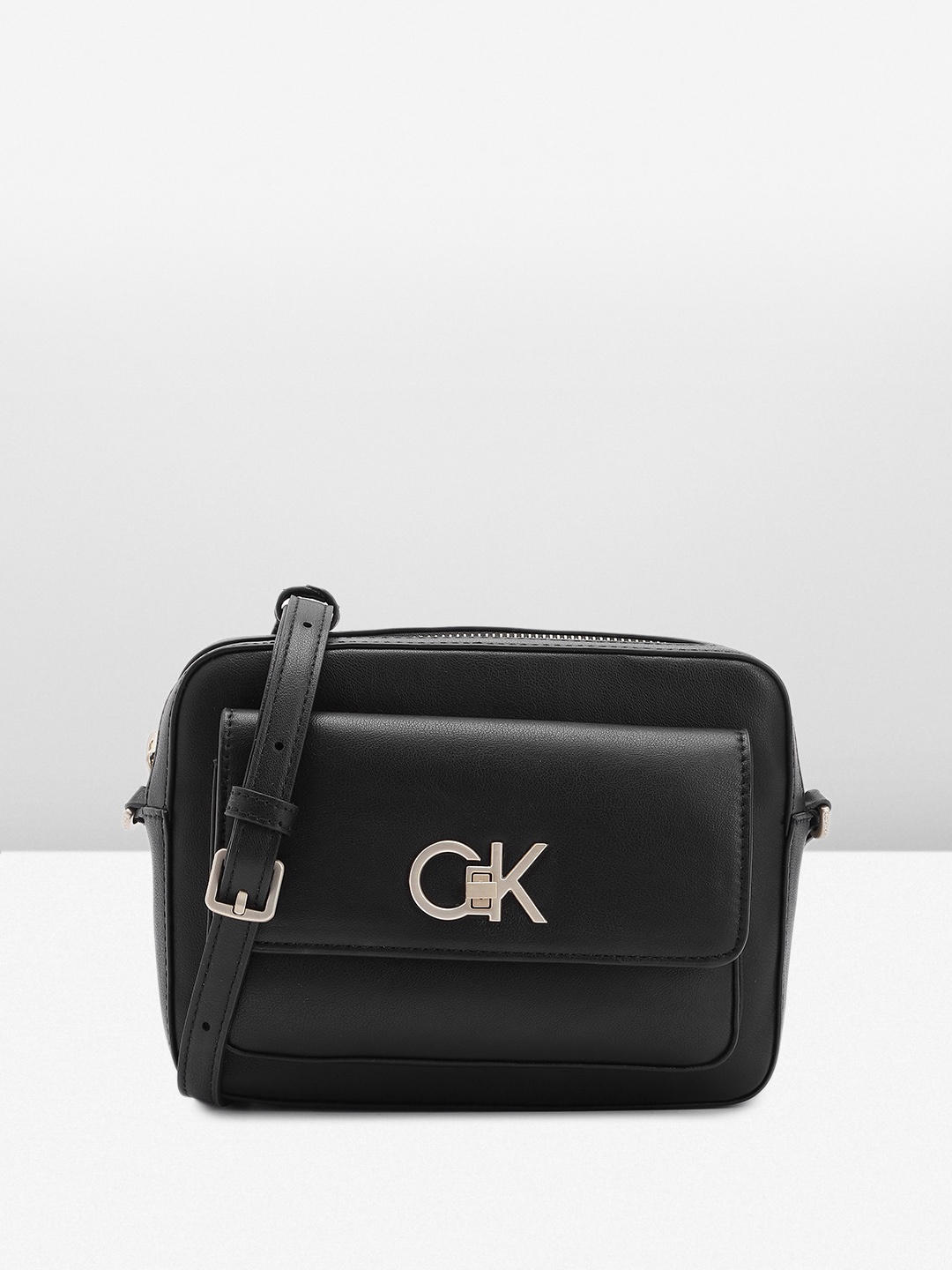 

Calvin Klein Women Solid Sling Bag, Black