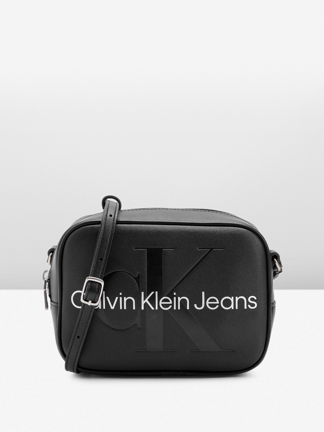 

Calvin Klein Brand Logo Printed Sling Bag, Black