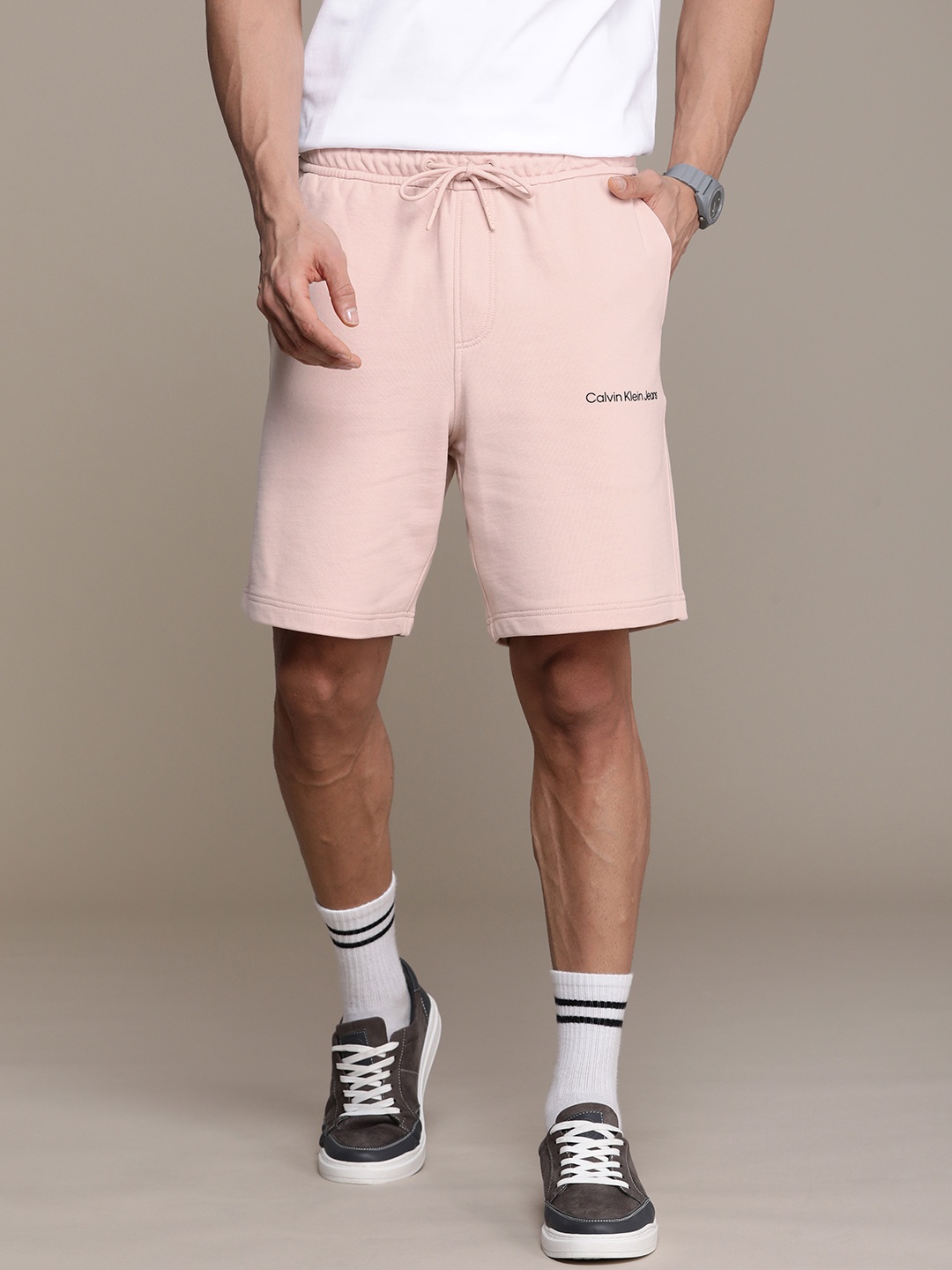 

Calvin Klein Jeans Men Solid Pure Cotton Regular Shorts, Pink