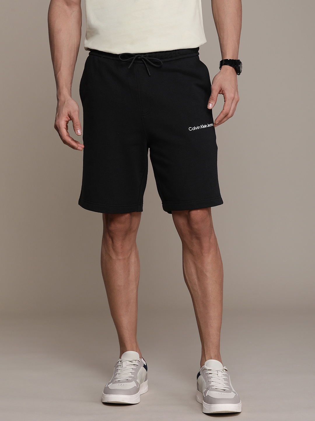 

Calvin Klein Jeans Men Solid Pure Cotton Regular Shorts, Black