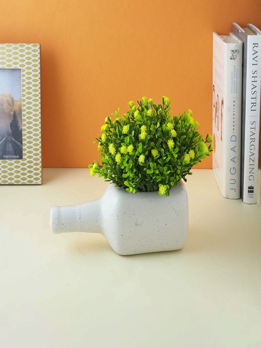 

The Decor Mart White Textured Ceramic Bottle Shaped Planter