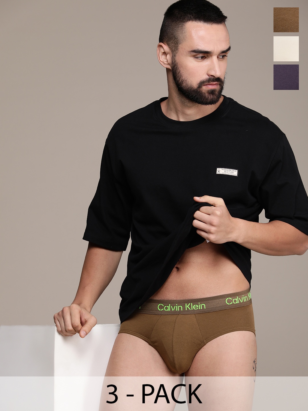 

Calvin Klein Underwear Men Pack Of 3 Mid-Rise Solid Briefs NB3704FZ4, Purple