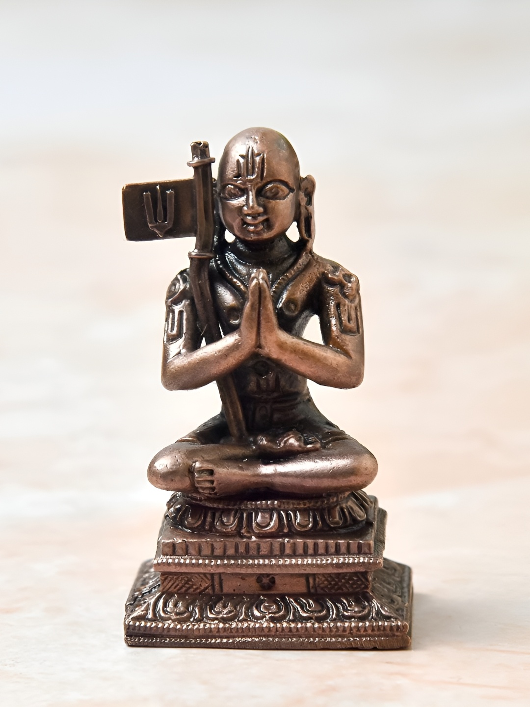 

Bhimonee Decor Copper Toned Shri Ramanuja Idol Showpiece