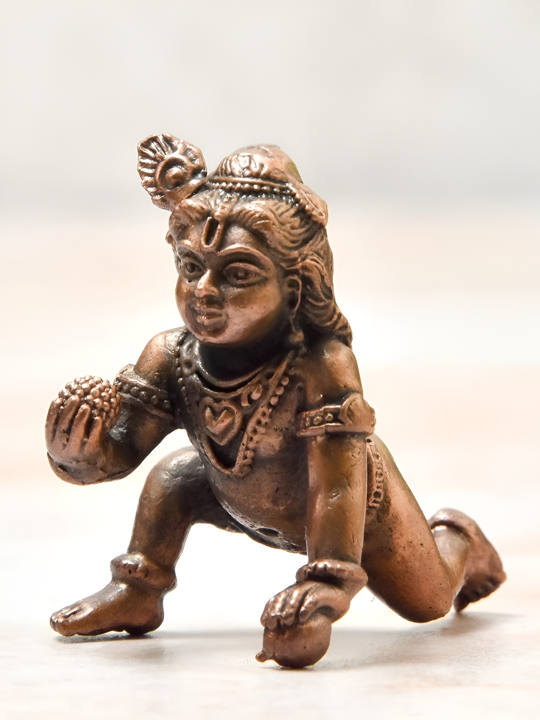 

Bhimonee Decor Copper Toned Bal Krishna Idol Showpiece