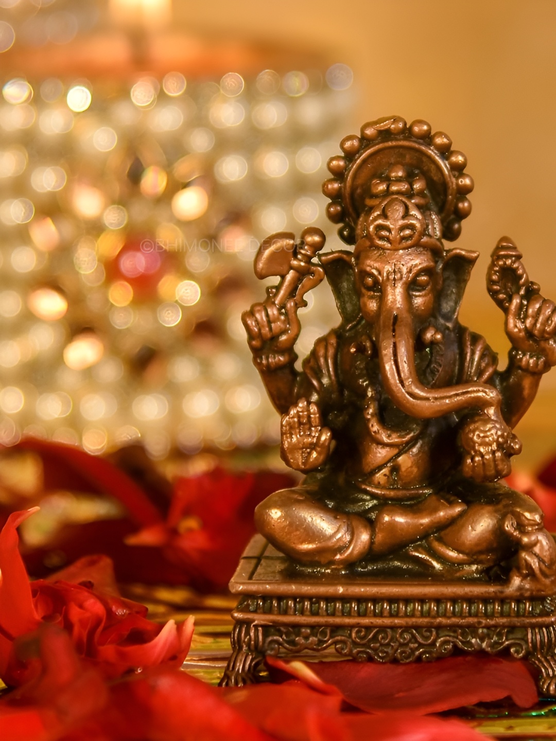 

Bhimonee Decor Copper Toned Ganesha Idol Showpiece