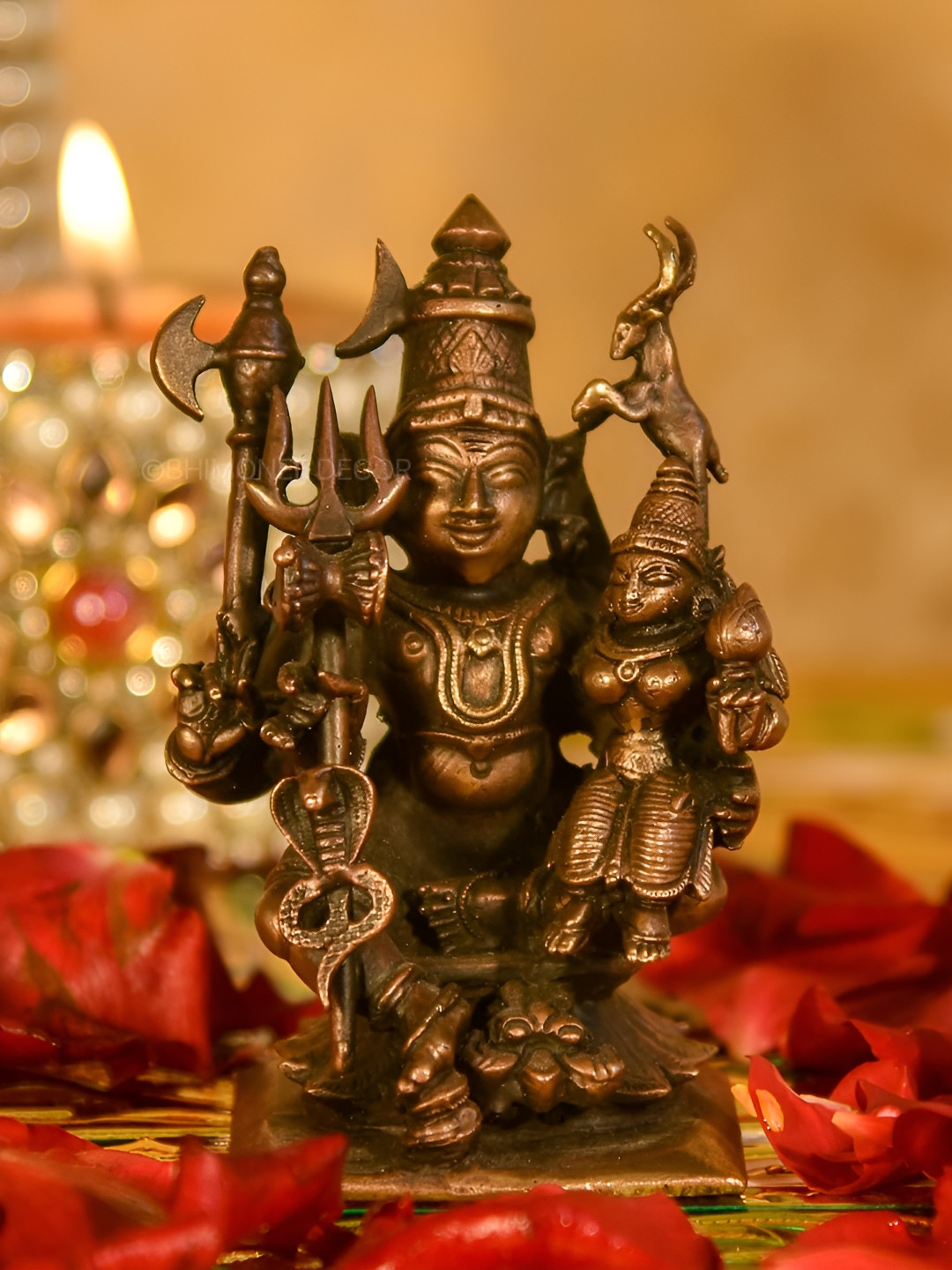

Bhimonee Decor Copper-Toned &Brown Lord Shiv Parwati Idol Showpiece