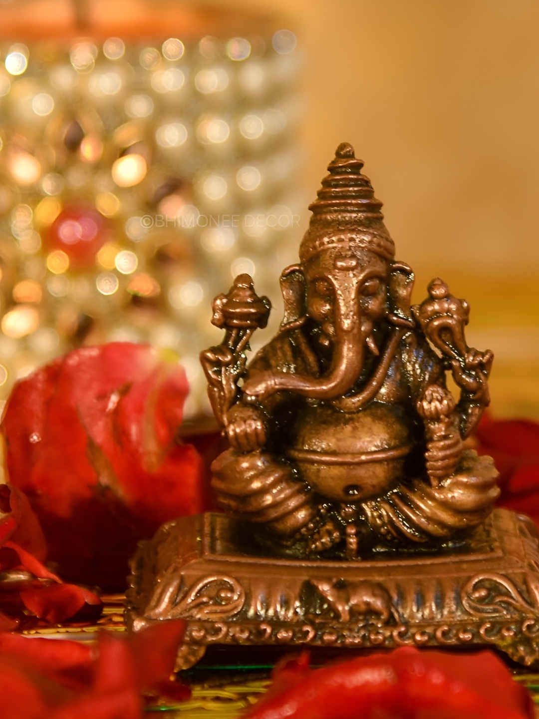 

Bhimonee Decor Copper-Toned &Brown Ganesha Idol Showpiece