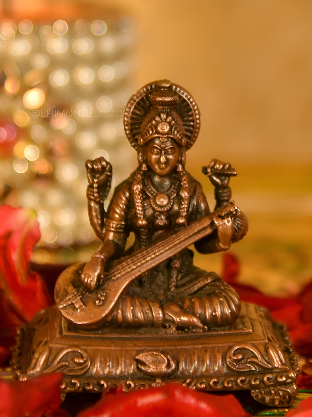 

Bhimonee Decor Copper-Toned &Brown Saraswati Idol Showpiece