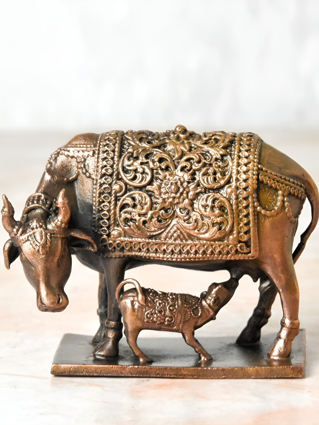 

Bhimonee Decor Copper-Toned& Brown Cow And Calf Idol Showpiece