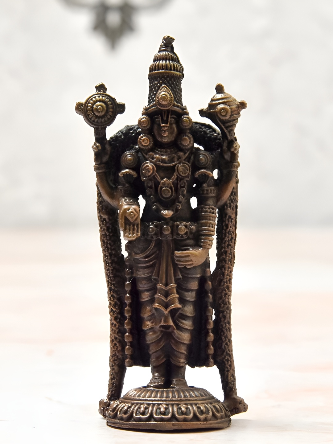 

Bhimonee Decor Copper-Toned &Brown Balaji Idol Showpiece