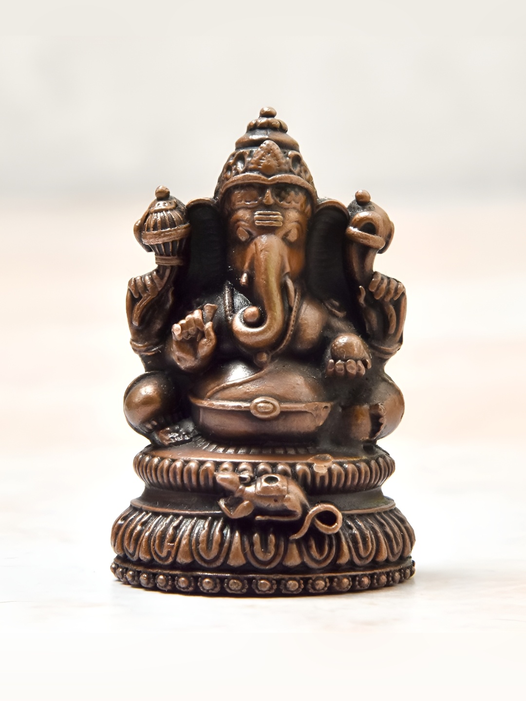 

Bhimonee Decor Copper-Toned& Brown Ganesha Idol Showpiece