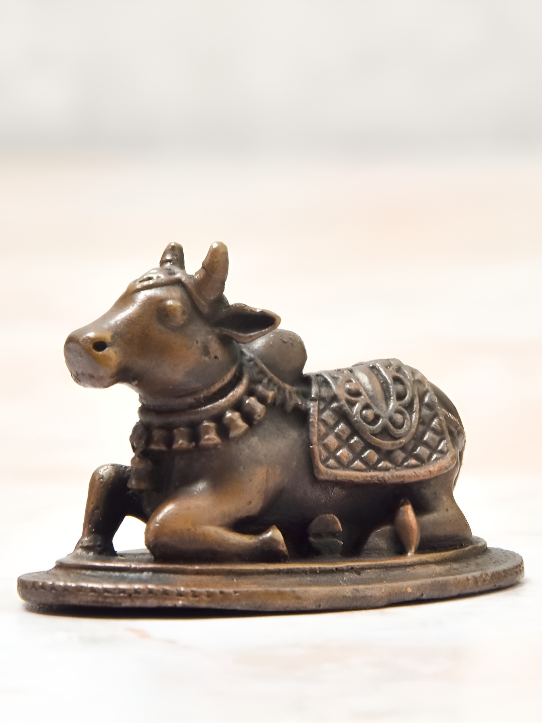

Bhimonee Decor Copper-Toned &Brown Nandi Idol Showpiece