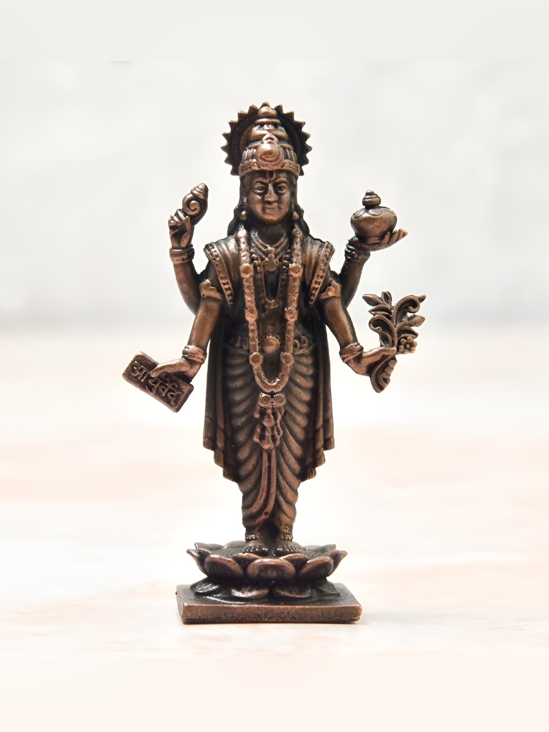 

Bhimonee Decor Copper-Toned &Brown Dhanvanti Idol Showpiece
