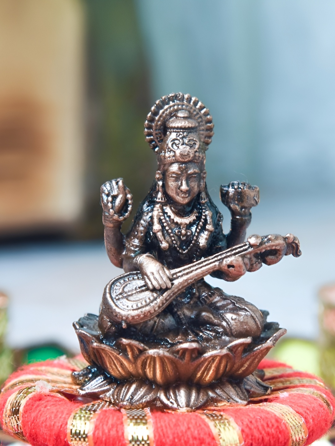 

Bhimonee Decor Copper Toned Idol Showpiece