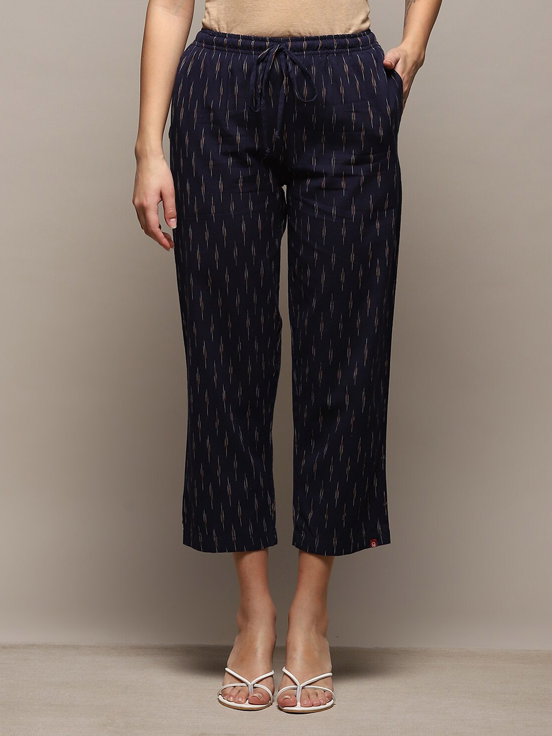 

Biba Ethnic Motif Printed Flared Palazzos, Navy blue