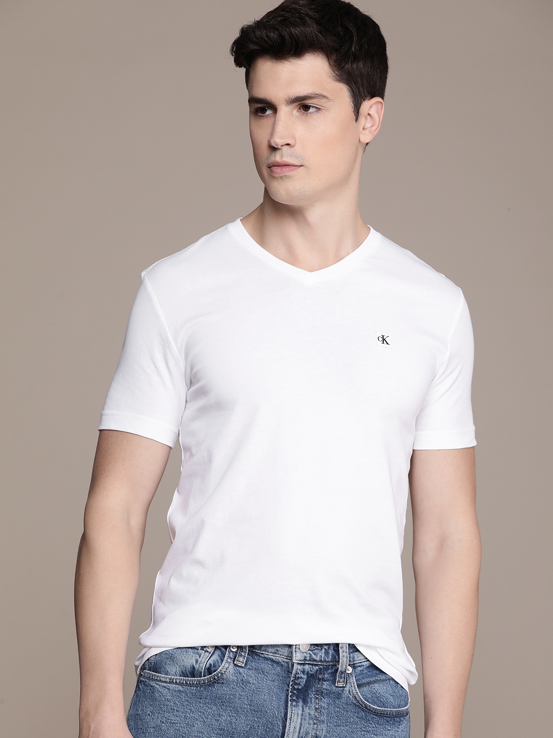 

Calvin Klein Jeans Solid V-Neck Pure Cotton Slim Fit T-shirt, White