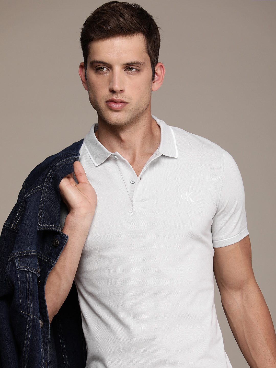 

Calvin Klein Jeans Men Polo Collar Pure Cotton Slim Fit T-shirt, Grey