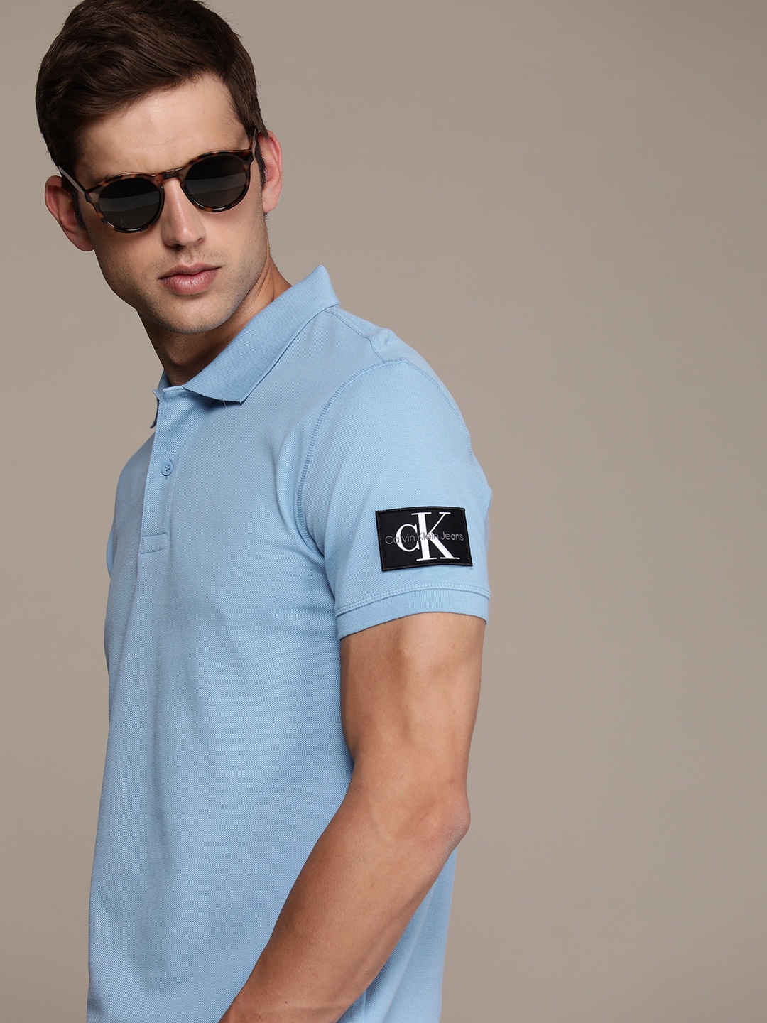 

Calvin Klein Jeans Polo Collar Pure Cotton Applique T-shirt, Blue