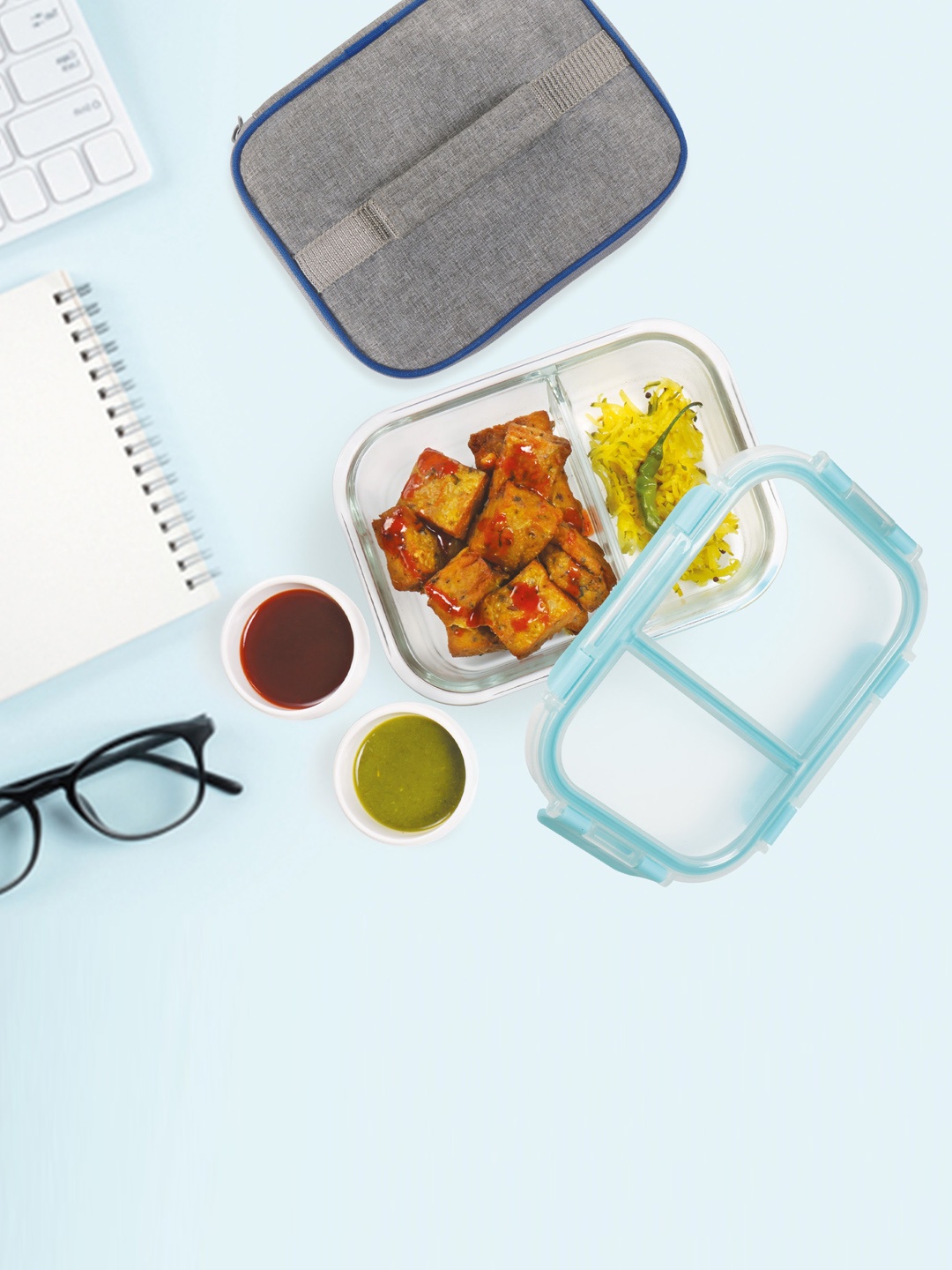 

Treo Transparent All Fresh Rectangular Divider Glass Tiffin Containers With Jacket- 600ml