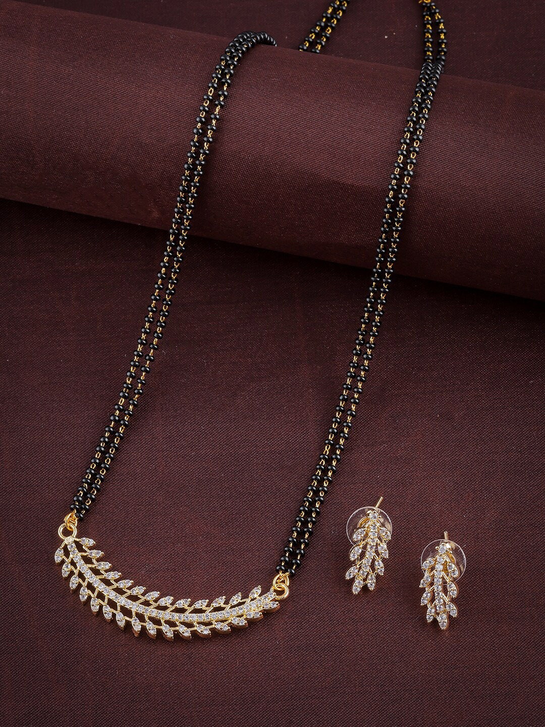 

Anouk Gold-Plated American Diamond-Studded & Beaded Mangalsutra Set