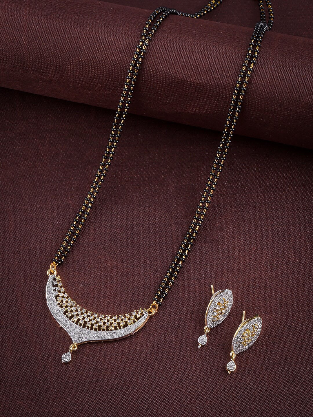 

Anouk Gold-Plated American Diamond-Studded & Beaded Mangalsutra Set