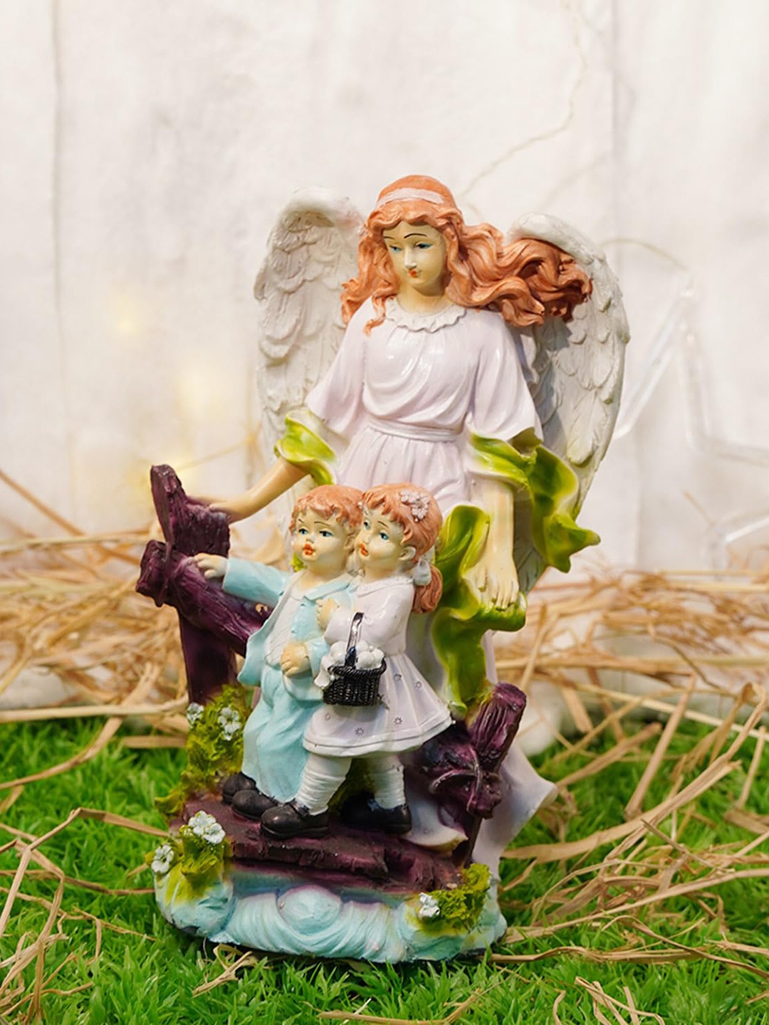 

PujaNPujari White & Green Angel Statue Showpiece