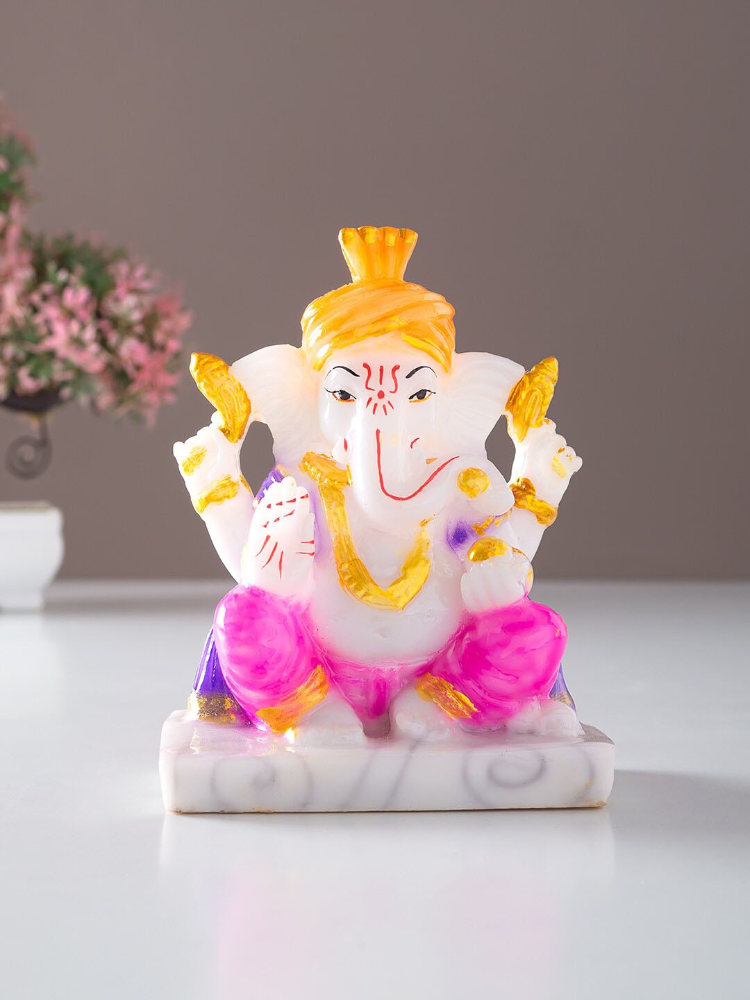 

Golden Peacock White & Pink Ganesh Idol Showpiece