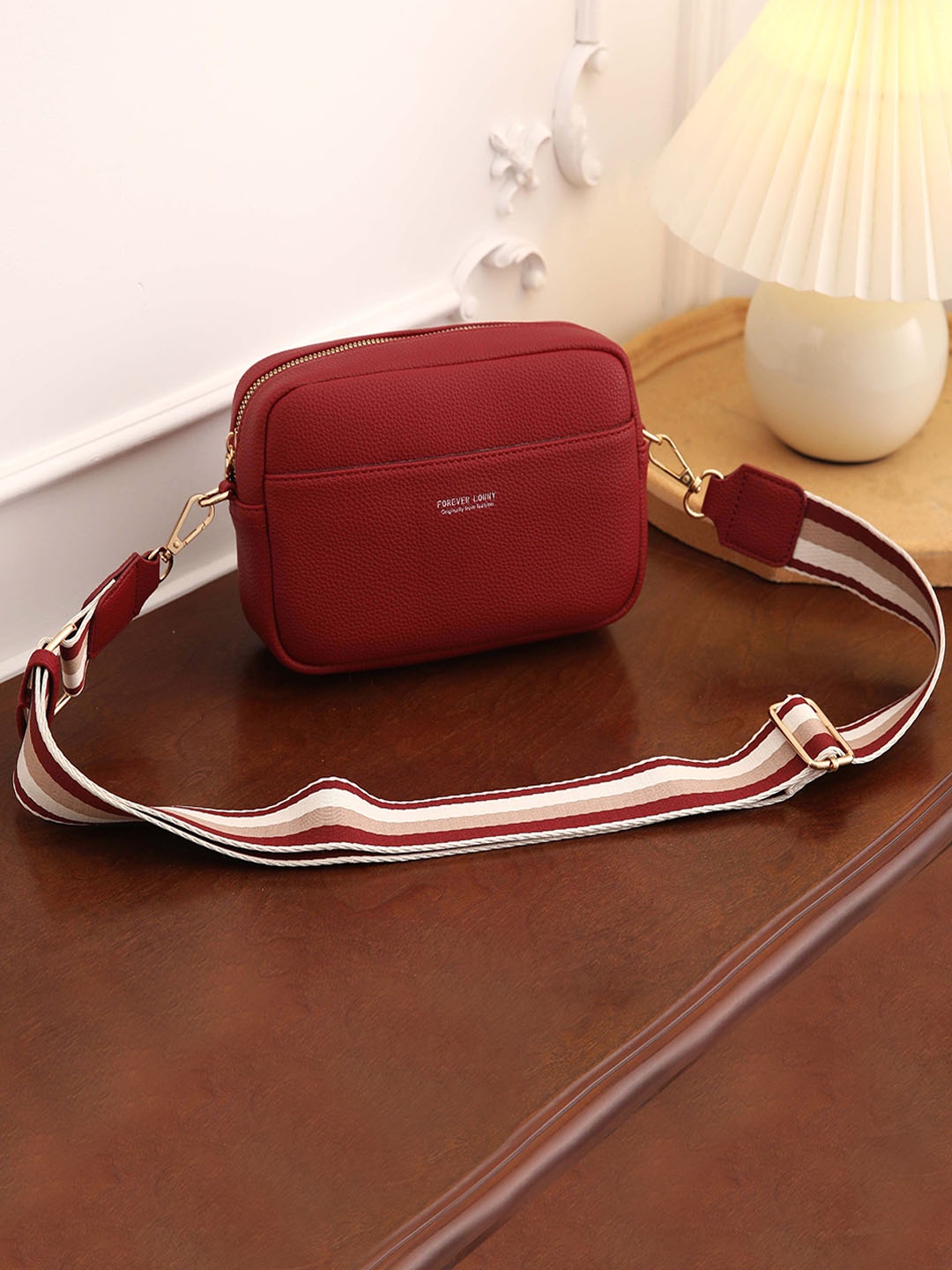 

Diva Dale Maroon PU Miniature Sling Bag