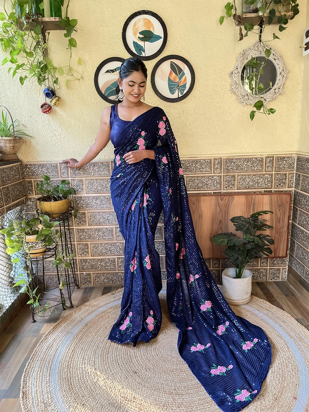 

Mitera Navy Blue Floral Embroidered Sequinned Saree