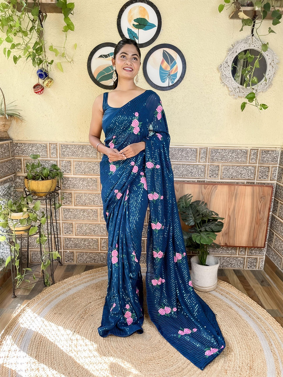 

Mitera Teal Floral Printed Sequinned Saree