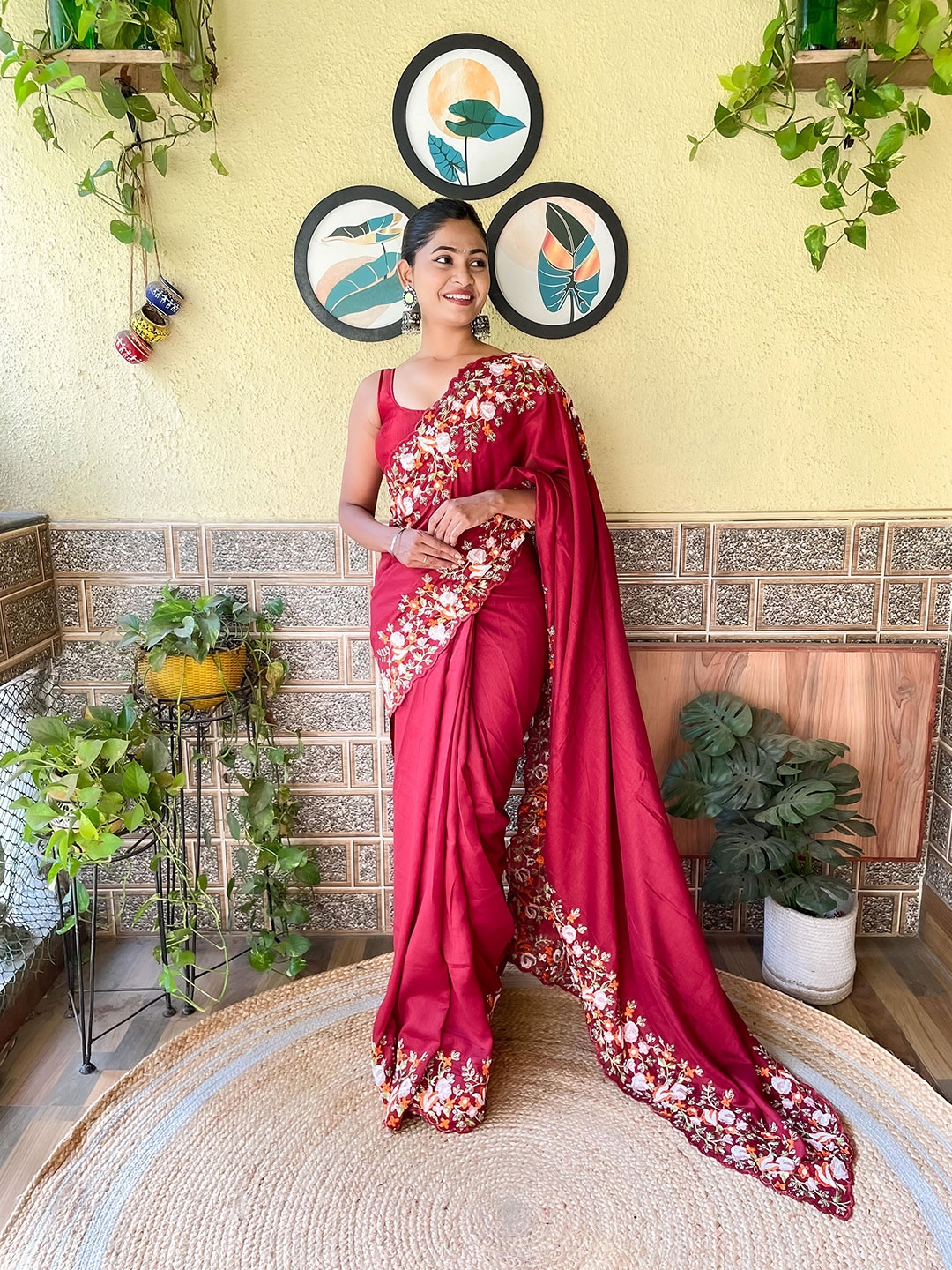 

Mitera Maroon Embroidered Saree