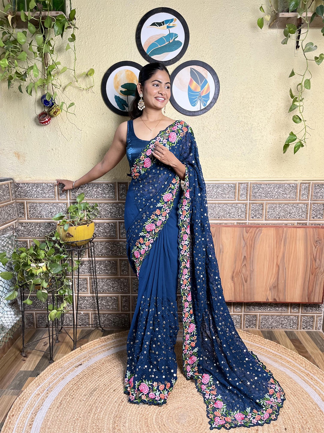 

Mitera Teal Floral Embroidered With Sequinned Saree