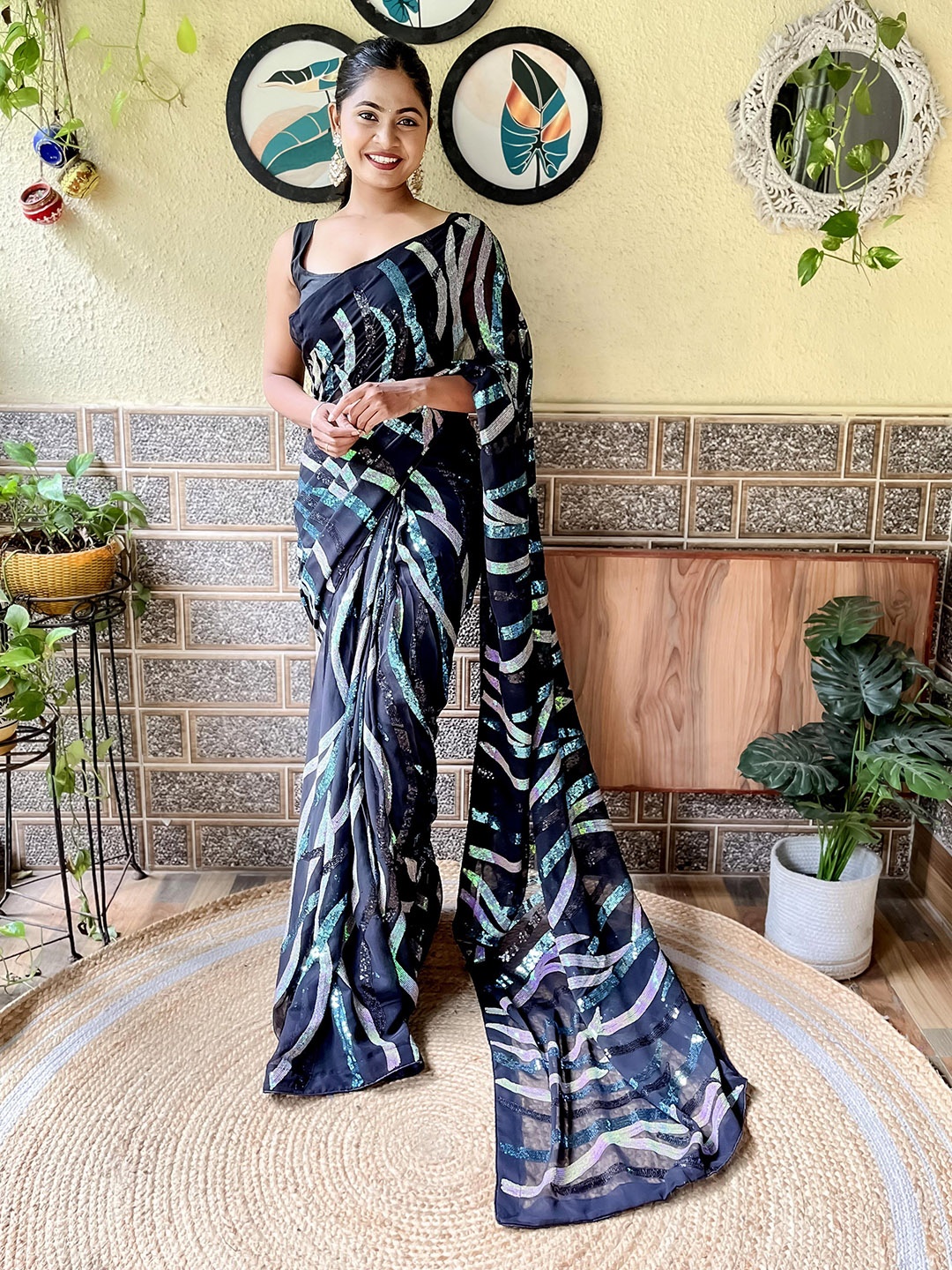 

Mitera Black Leheriya Sequinned Saree