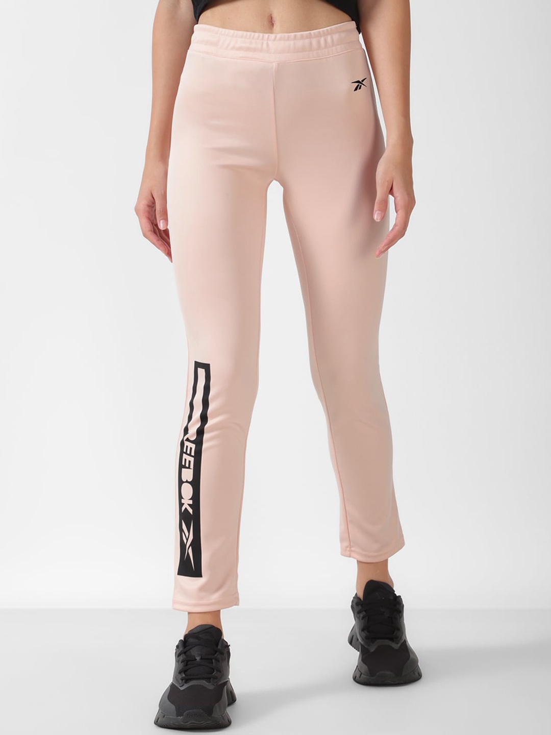 

Reebok Women Brand Logo Printed Relaxed-Fit Track Pants, Pink
