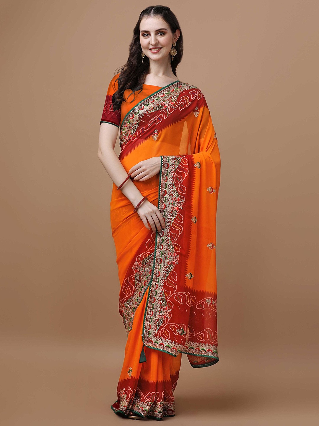 

Mitera Orange Ethnic Motifs Embroidered Bandhani Saree