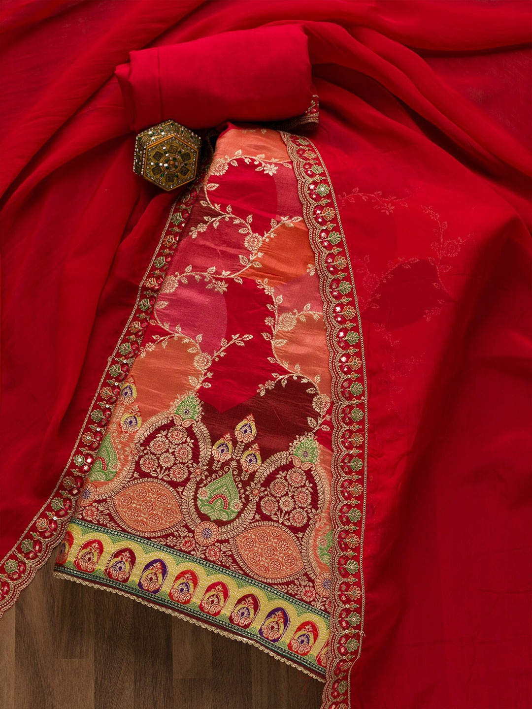 

Koskii Red Ethnic Motifs Woven Design Velvet Unstitched Dress Material