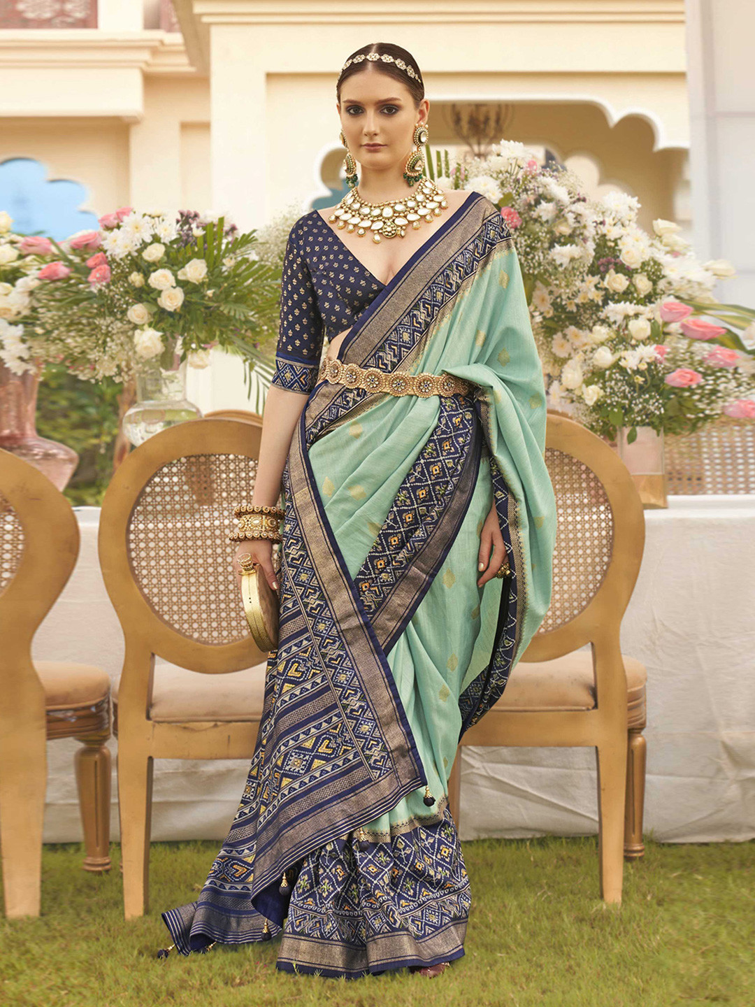 

Mitera Sea Green Ethnic Motifs Woven Designed Zari Patola Saree