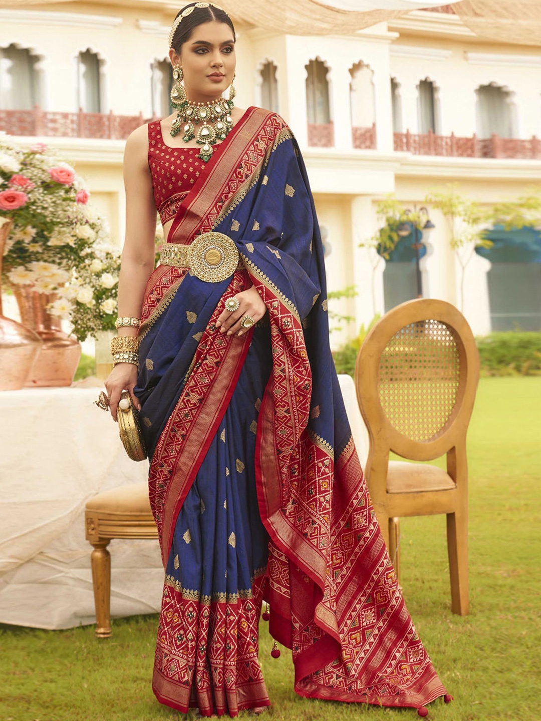 

Mitera Navy Blue Ethnic Motifs Woven Design Zari Patola Saree