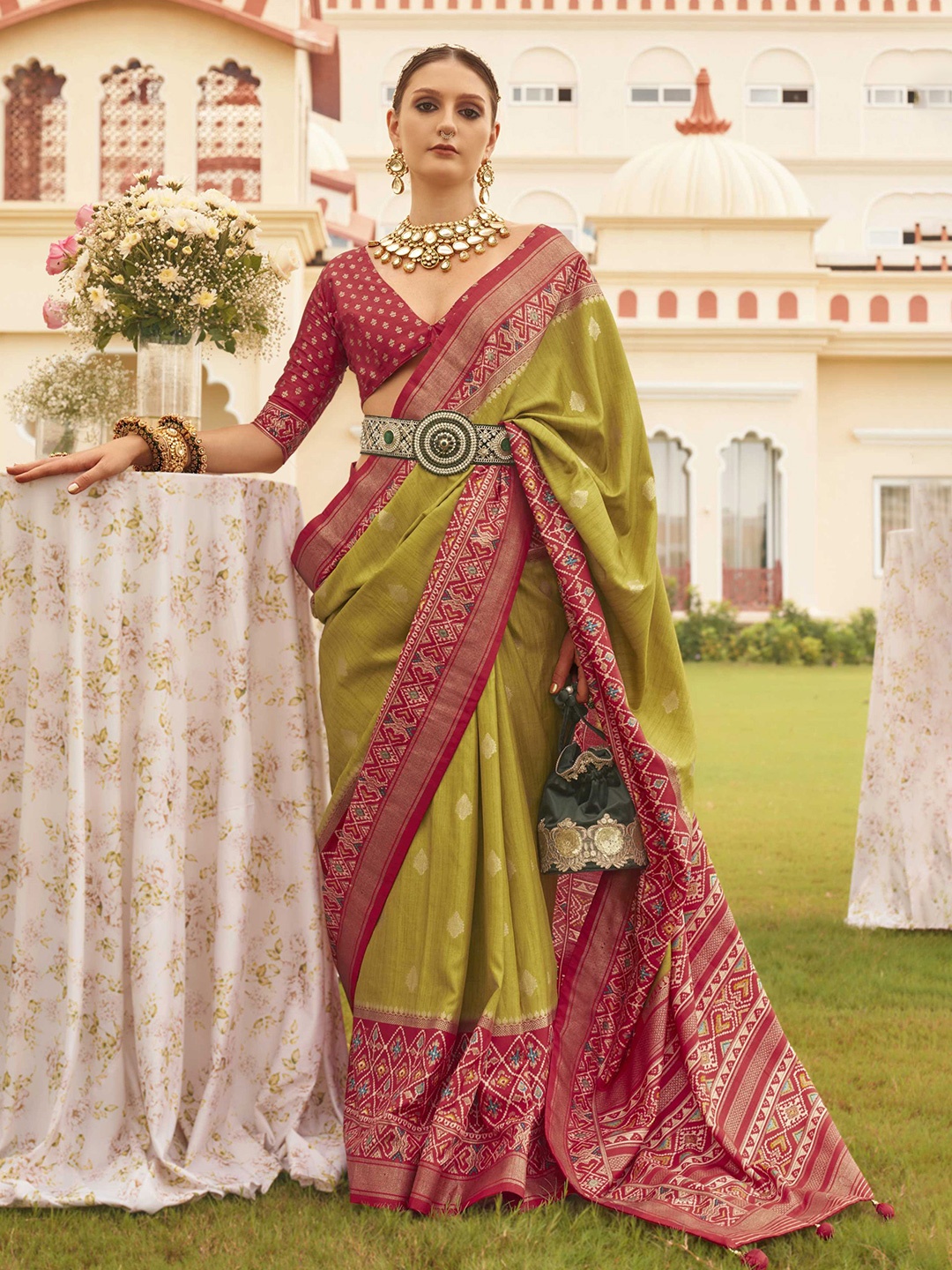 

Mitera Olive Green Ethnic Motifs Woven Design Zari Patola Saree