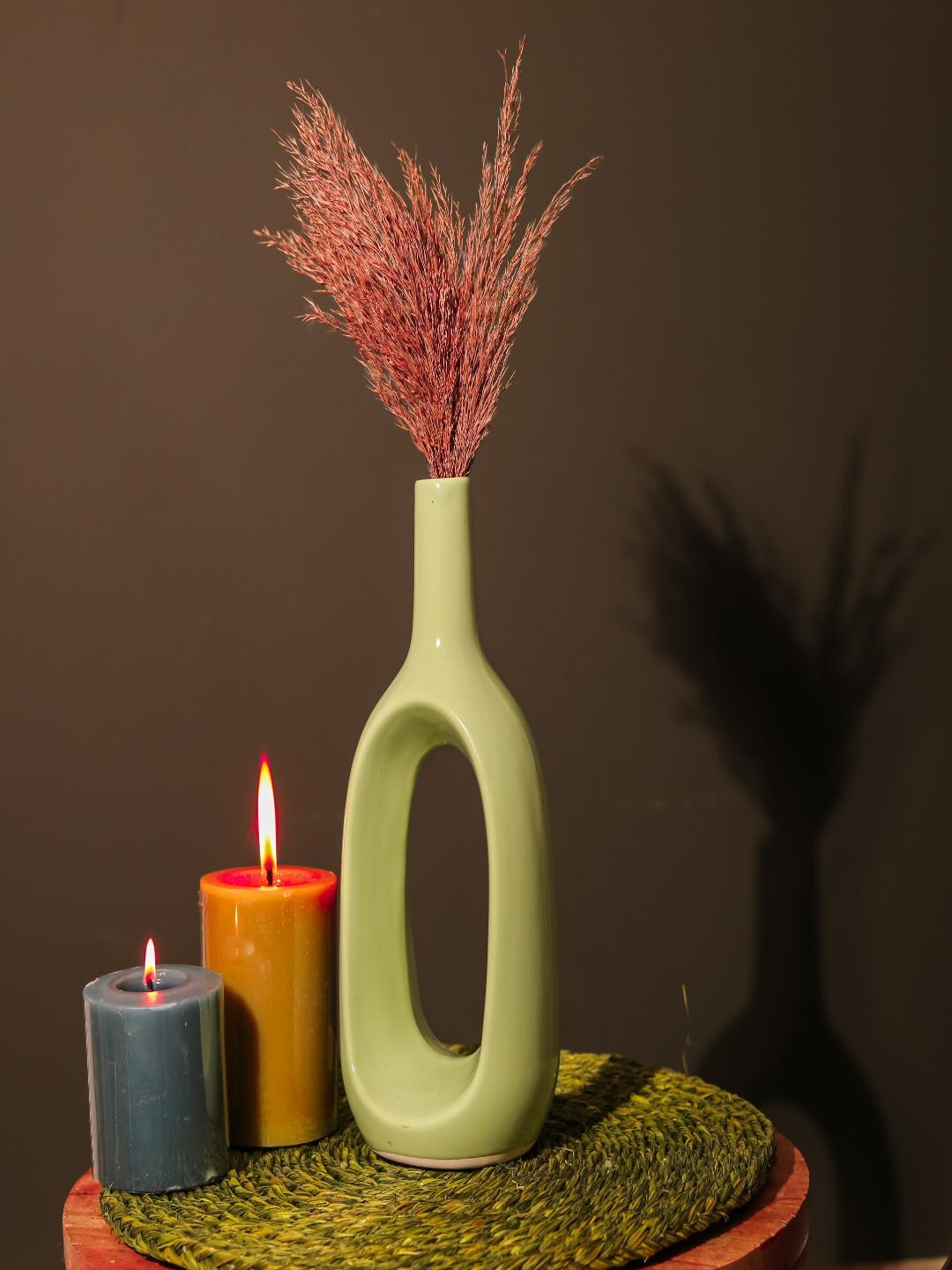 

The Decor Mart Light Green Hollow Glossy Ceramic Vase