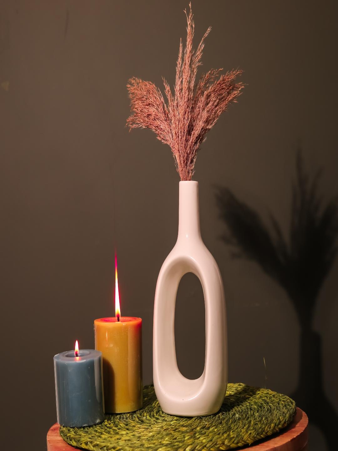 

The Decor Mart White Hollow Glossy Ceramic Vases