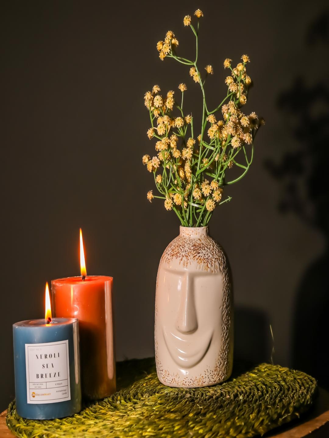 

The Decor Mart Blue Poker Face Ceramic Vase