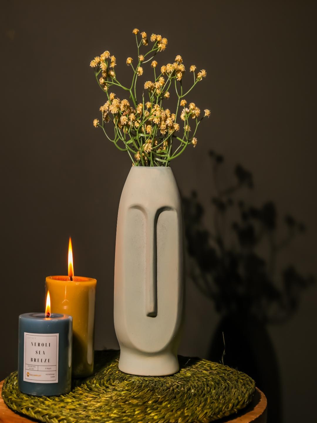 

The Decor Mart Green Ceramic Face Vase