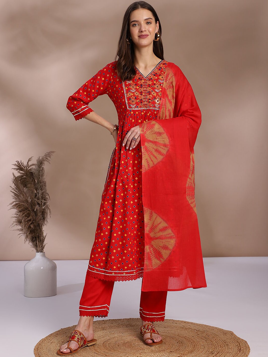 

Anouk Red Ethnic Motifs Printed Thread Work Detailed A-Line Kurta & Trouser With Dupatta