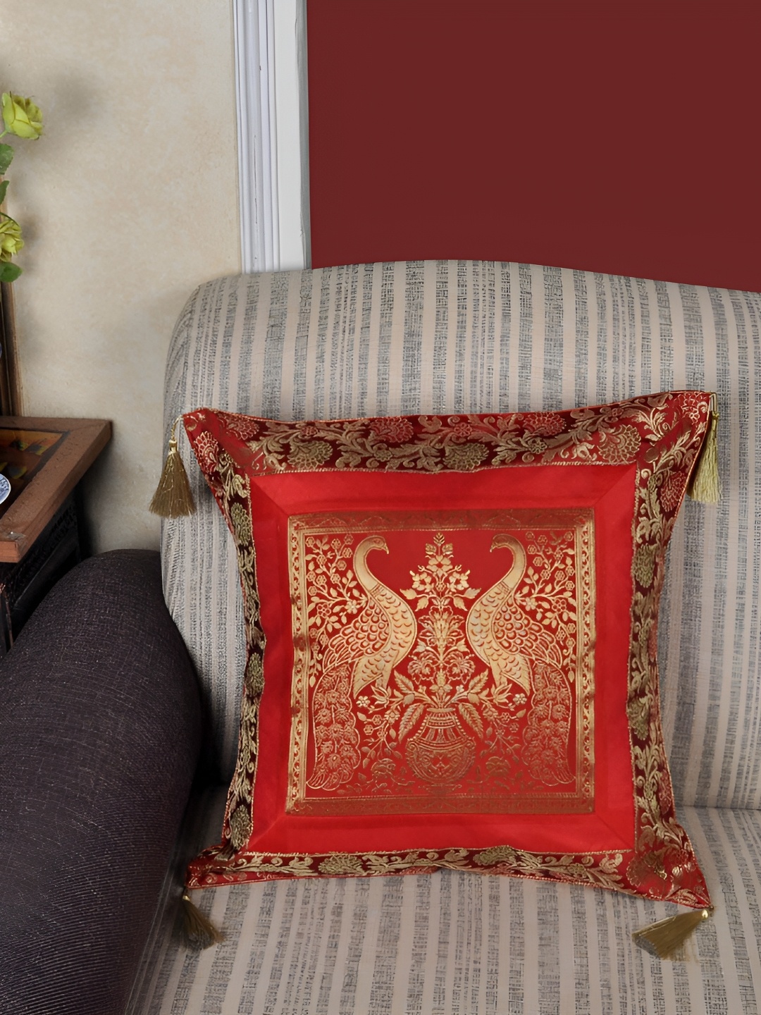 

Lal Haveli Red & Gold Toned Ethnic Motifs Square Cushion Cover