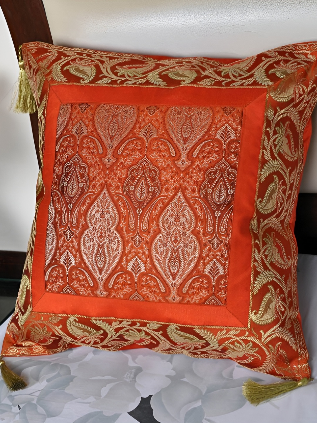 

Lal Haveli Orange & Gold Toned Ethnic Motifs Square Cushion Cover