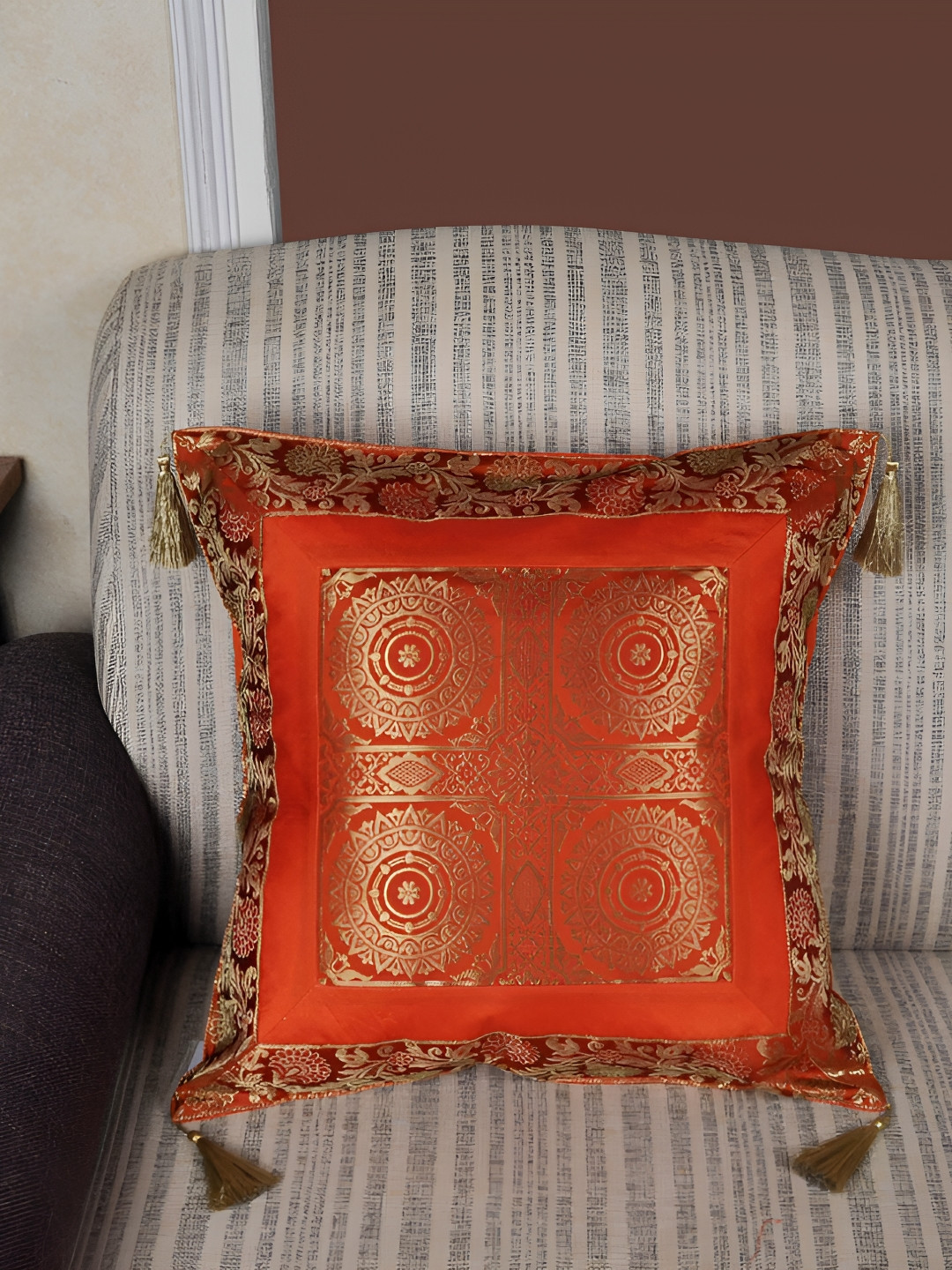 

Lal Haveli Orange & Gold Toned Ethnic Motifs Square Cushion Cover